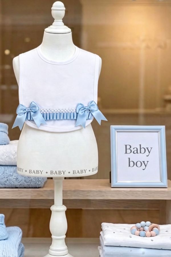 Baby-Spanish-style-cotton-bib-with-blue-frill.jpg